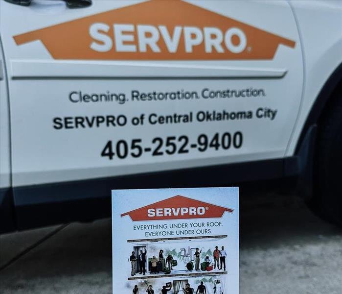 SERVPRO of Central Oklahoma City work truck and business postcard.
